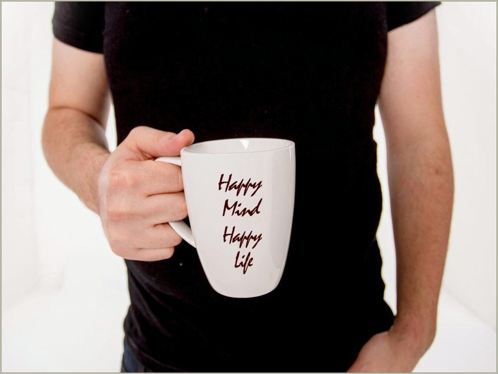 Free Psd Coffee Cup In Hand Mockup Template